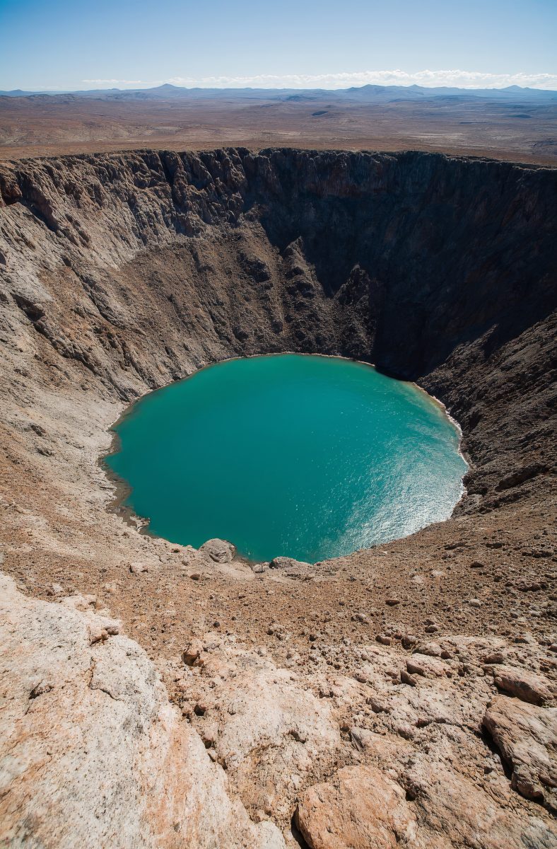 Turquoise Crater Lake in Vast Desert Volcanic Caldera